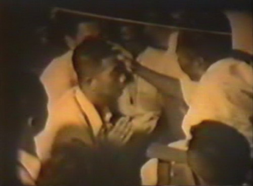 Nam Man Solos Mongkol being smeared during the ceremony